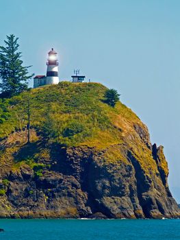 Lighthouse at Cape Disappointment at Fort Canby State Park in WA USA with Light