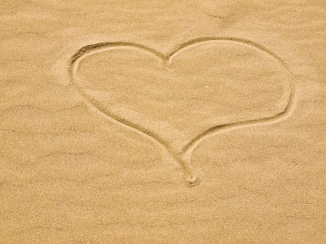 Heart in the Sand on a Sunny Day