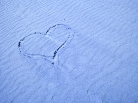 Heart in the Sand on a Sunny Day