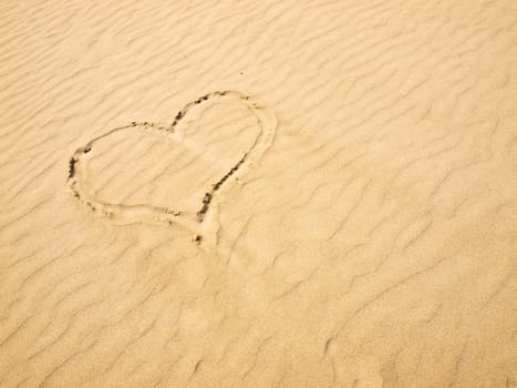 Heart in the Sand on a Sunny Day