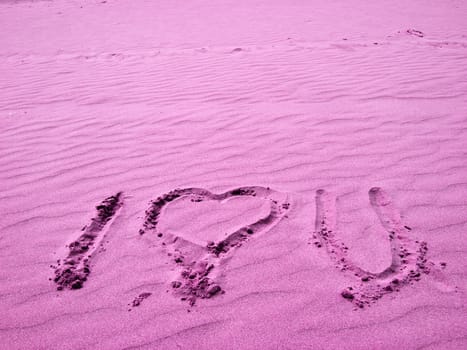 I Love You Written in Pink Sand