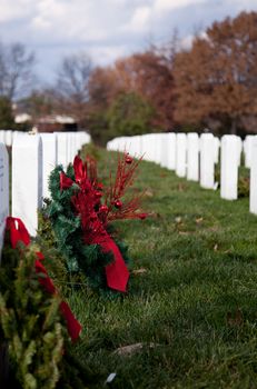 Christmas wreaths on gravestones in Arlington National Cemetery. The wreathes have been donated each year since 1992.