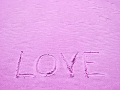 Love Written in Pink Sand on a Sunny Day