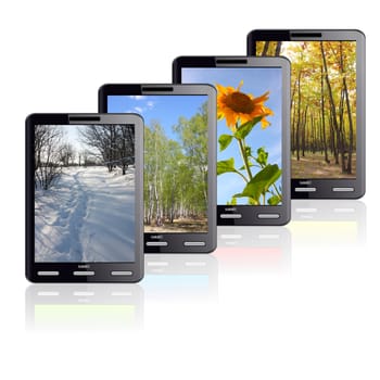 Vertical Tablet computer isolated on the white background. Four different colors stand one by one. Times of the year.