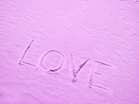 Love Written in Pink Sand on a Sunny Day