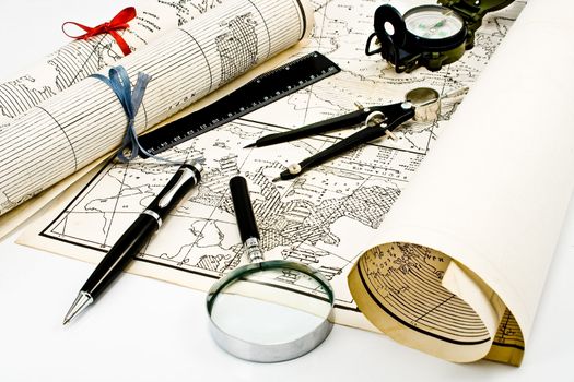 Old Maps with compass and magnifier