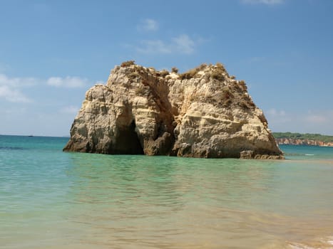 A lonely rock in the ocean. The effect of erosion