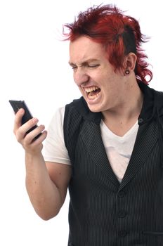 Young angry man with wild red hair yells into cell phone