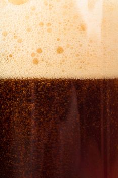 Closeup view of dark beer in the glass