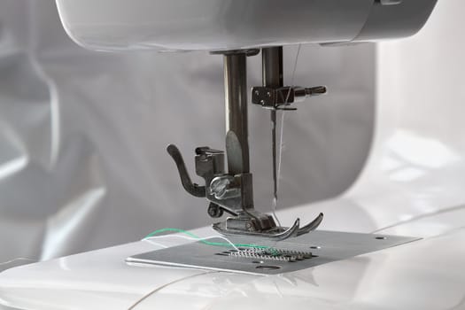 Close up on a sewing machine 
