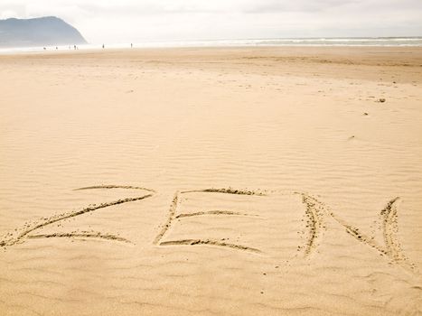 Zen Written in the Sand on a Sunny Day