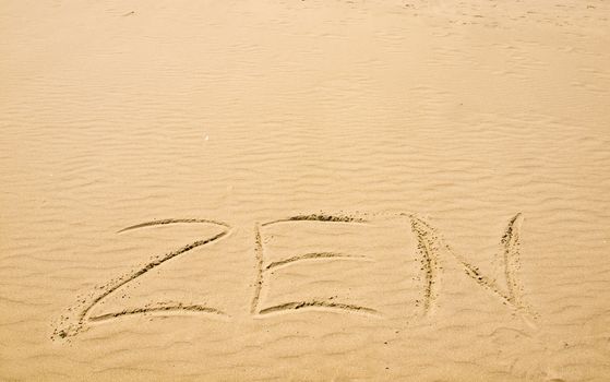 Zen Written in the Sand on a Sunny Day