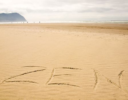 Zen Written in the Sand on a Sunny Day