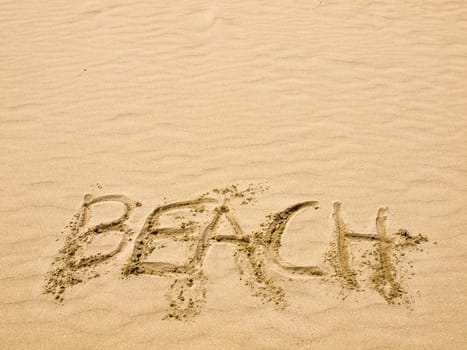 Beach Written in the Sand on a Sunny Day