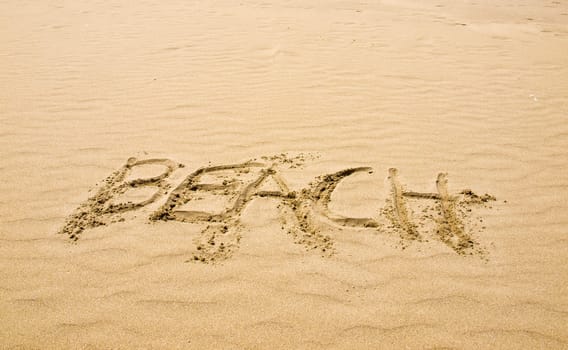 Beach Written in the Sand on a Sunny Day