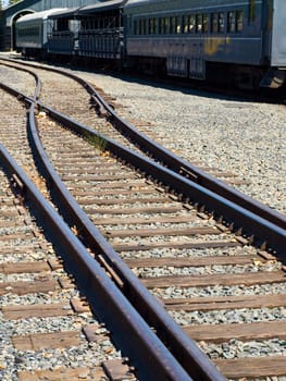 Old Railroad Tracks at a Junction on a Sunny Day