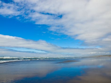 Coastline at the Beach on a Partly Cloudy and Sunny Day