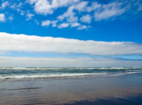 Coastline at the Beach on a Partly Cloudy and Sunny Day