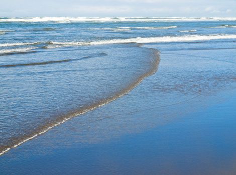 Coastline at the Beach on a Partly Cloudy and Sunny Day