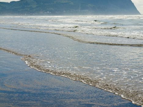 Coastline at the Beach on a Partly Cloudy and Sunny Day