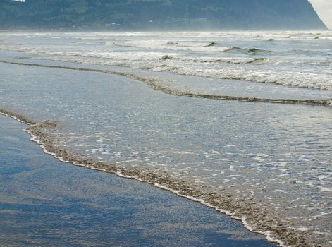 Coastline at the Beach on a Partly Cloudy and Sunny Day