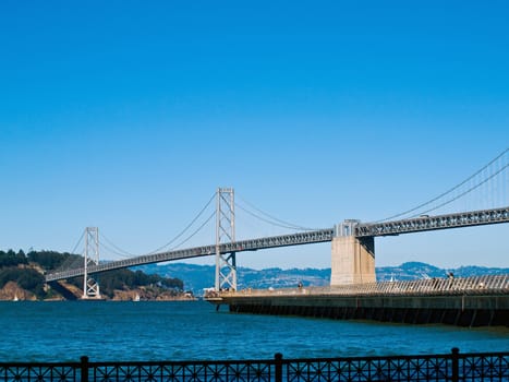 San Francisco Bay Bridge on a Clear Day with a Bright Blue Sky