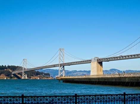 San Francisco Bay Bridge on a Clear Day with a Bright Blue Sky