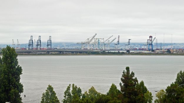 San Francisco Shipping Yards as Seen from Across the with Bay Bridge on a Cloudy Day