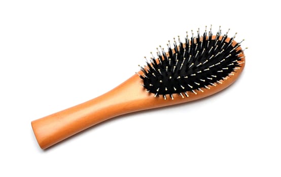 Wooden hairbrush isolated on white background