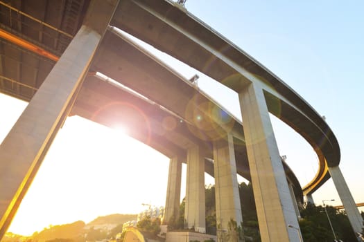 Flyover sunset in city