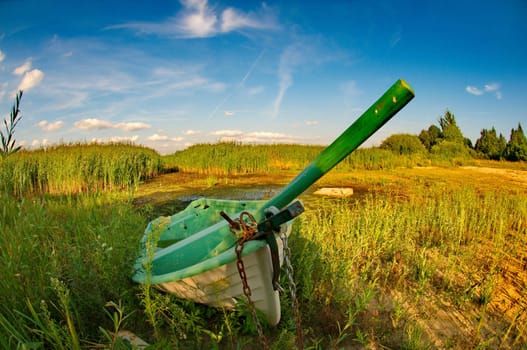 Abandoned boat in the grass