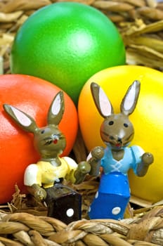 easter basket with painted eggs and bunnies