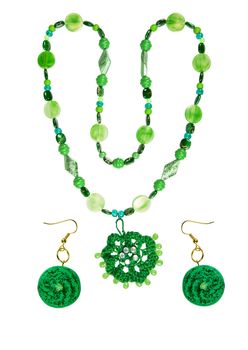 beads and earrings from plastic, wood, yarn glass isolated on a white background. collage