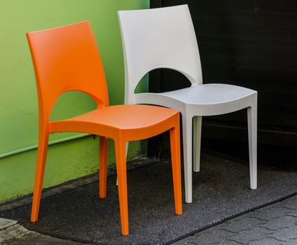 Pair of plastic chairs