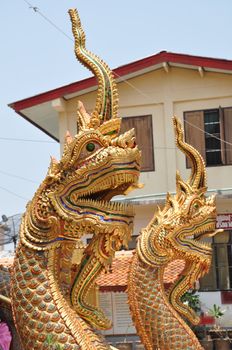 Nāga (Thai: พญานาค) is a large snake with a crest. Is a mark of greatness. 
