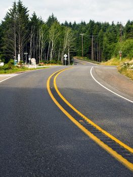 Curved Two Lane Country Road Winding Through a Forest