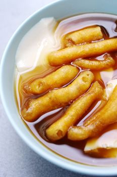 Tofu Pudding Dessert, Bean junket eaten hot with gingered sirup and mini deep-fried dough stick