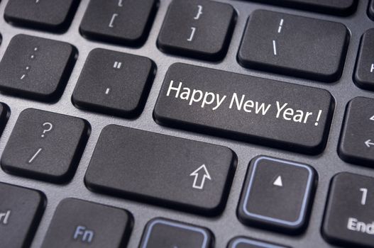 Photo of close up on keyboard pad enter key, for new year greetings and concepts.
