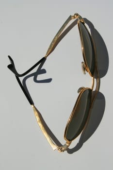 Close up of sunglasses on a white background.

