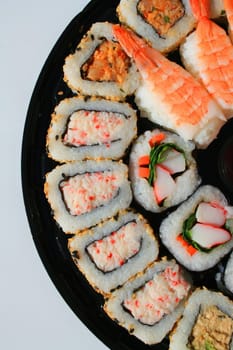 Close up of sushi assortment on a platter.
