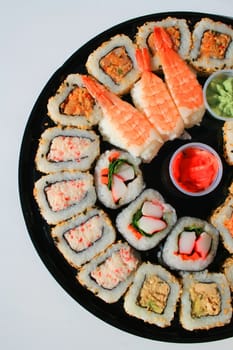 Close up of sushi assortment on a platter.
