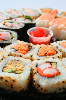 Close up of sushi assortment on a platter.
