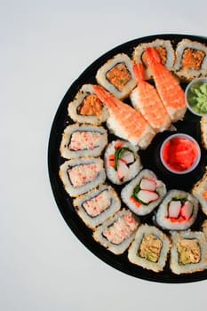 Close up of sushi assortment on a platter.
