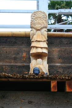 Close up of a big totem pole.
