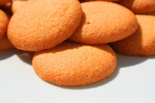 Close up of vanilla cookies on a plate.
