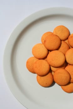 Close up of vanilla cookies on a plate.
