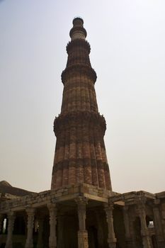 Qutab Minar with Mosque at Base, Delhi, India