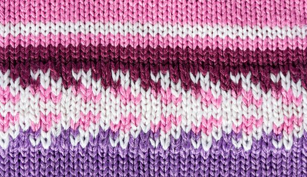 Lilac color wool knitted background closeup