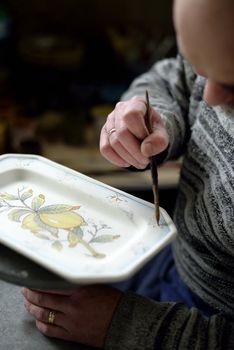 Traditional art of pottery's decoration in Tuscany