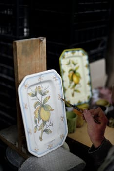 Traditional art of pottery's decoration in Tuscany